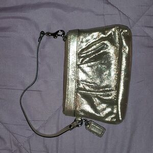 Coach gold wristlet